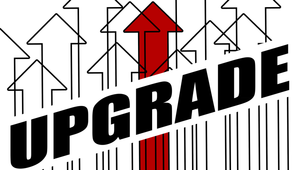 setas apontadas para cima escrito sobre elas a palavra UPGRADE, dando sentido para as setas